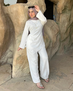 Élan Set in White – women's premium linen co-ord set side view, stone stairs