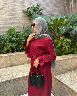 Elara Dress standing full look with black handbag