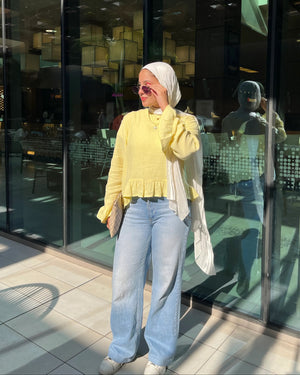 Sunbeam Top Butter Yellow full look with wide-leg jeans outdoors