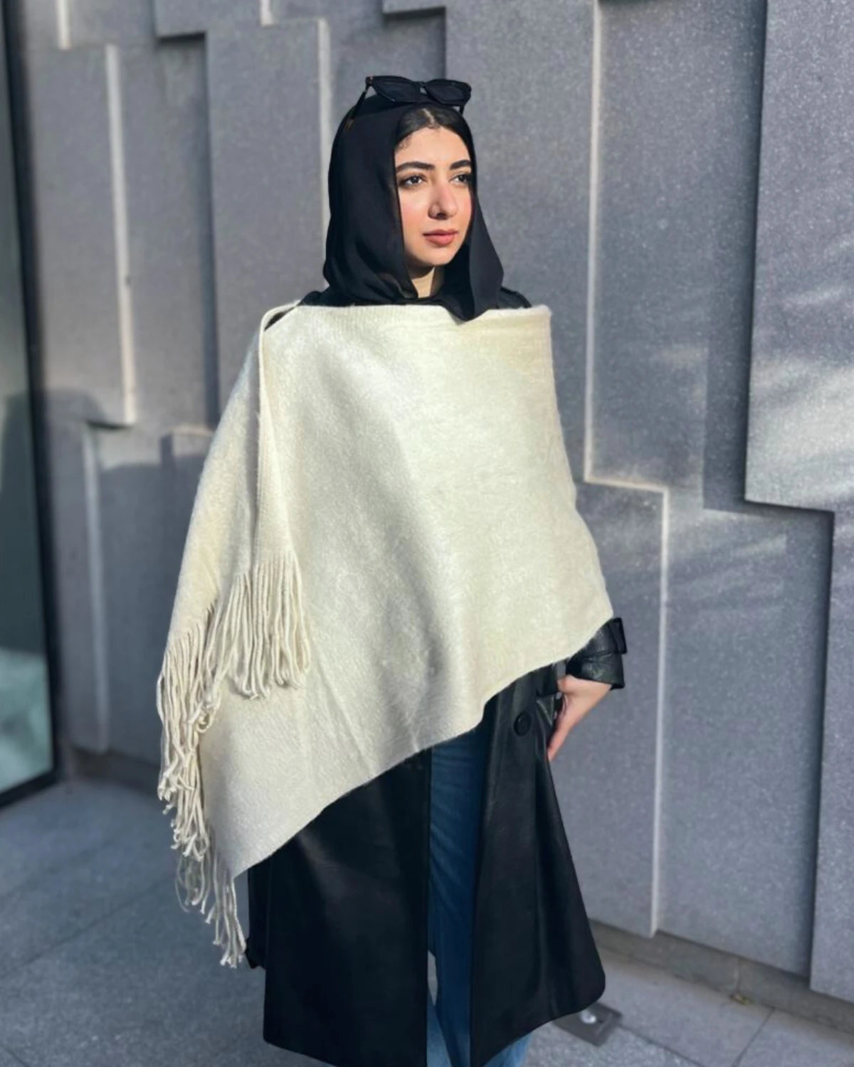 Beige mohair shawl draped elegantly showing soft texture and fringe detailing