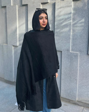 Black mohair shawl draped elegantly showing soft texture and fringe detailing