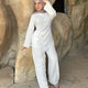 Élan Set in White – women's premium linen co-ord set side view, stone stairs