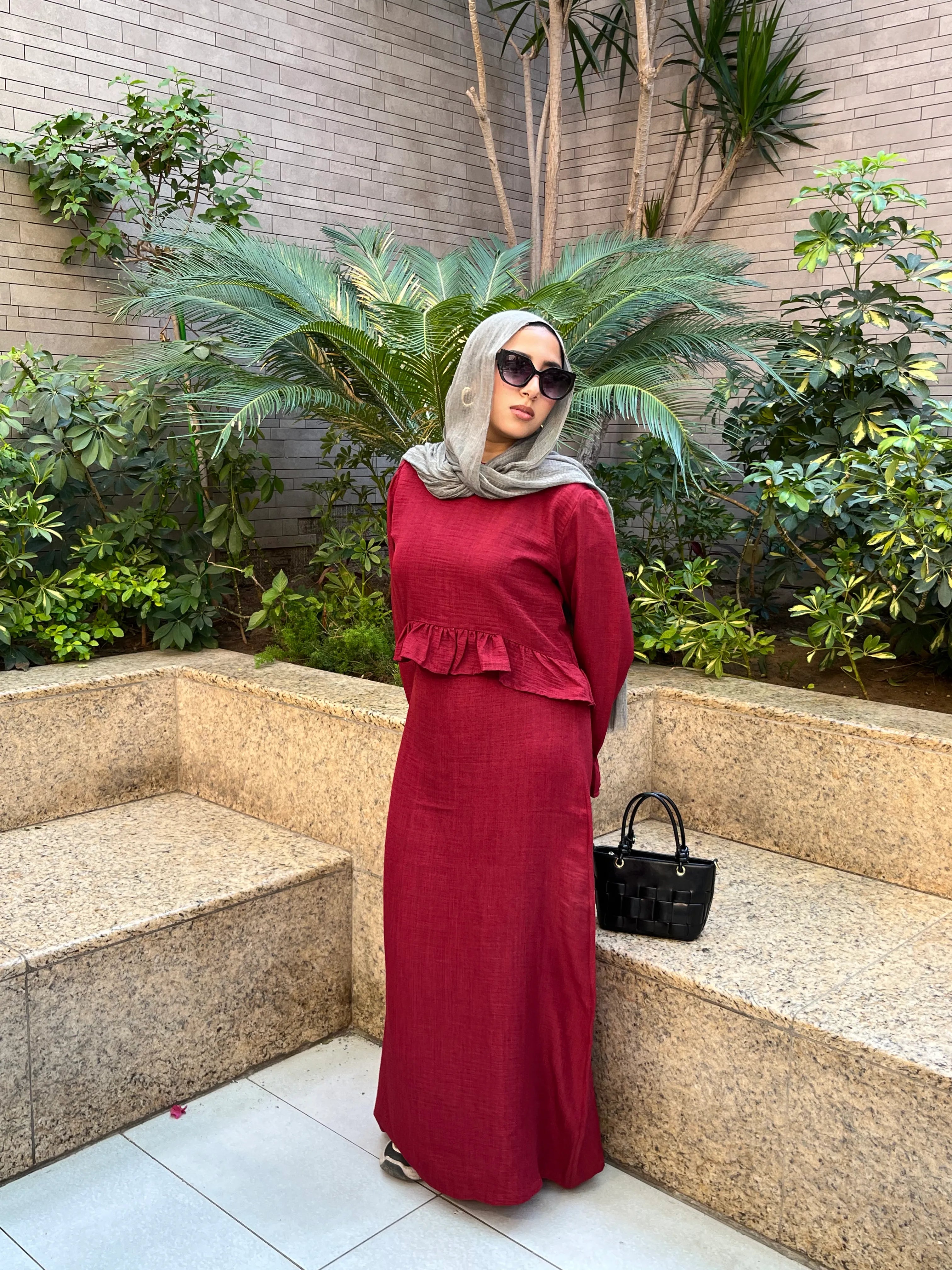Elara Dress side profile view outdoors with sunglasses