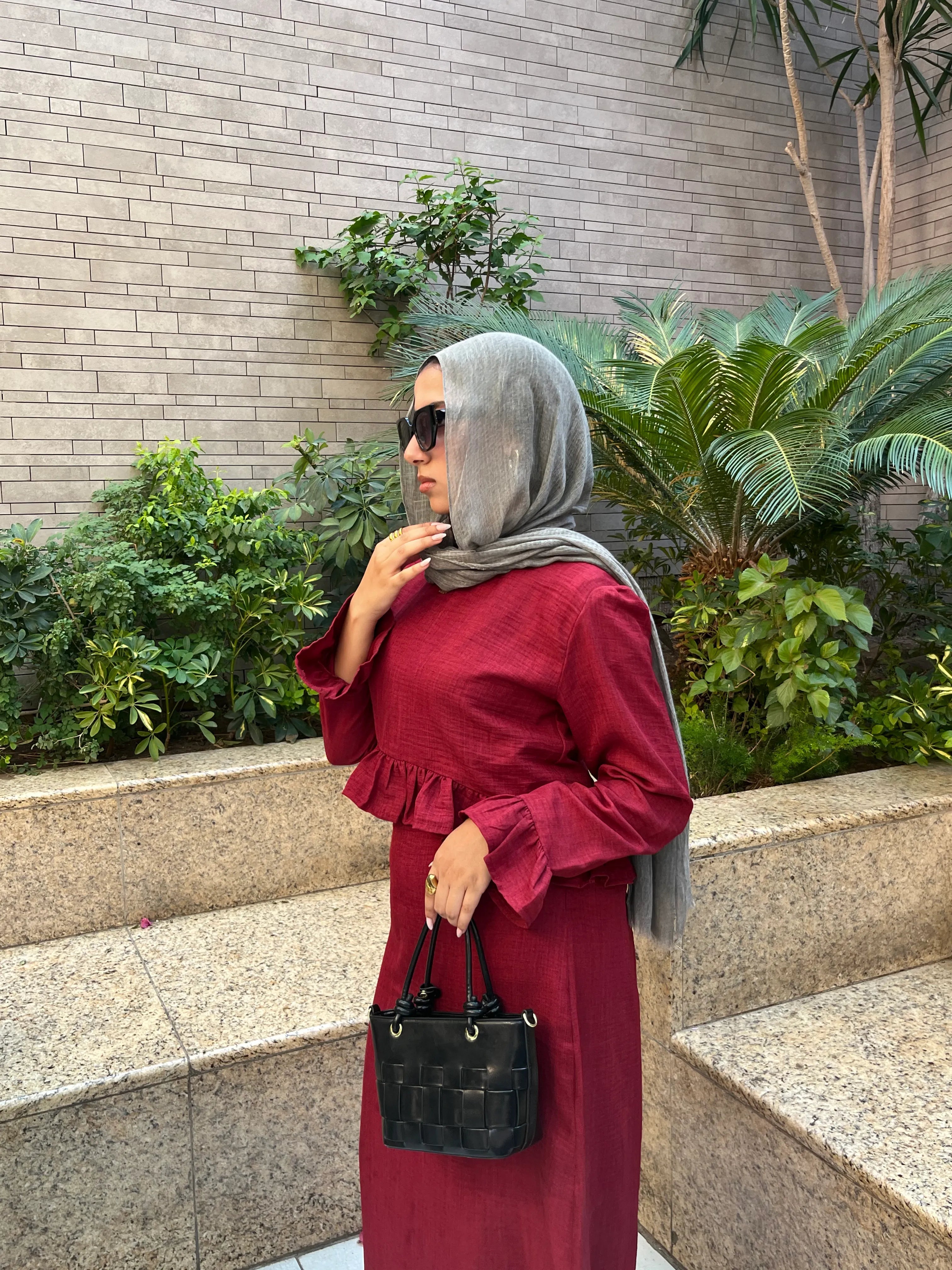 Elara Dress standing full look with black handbag