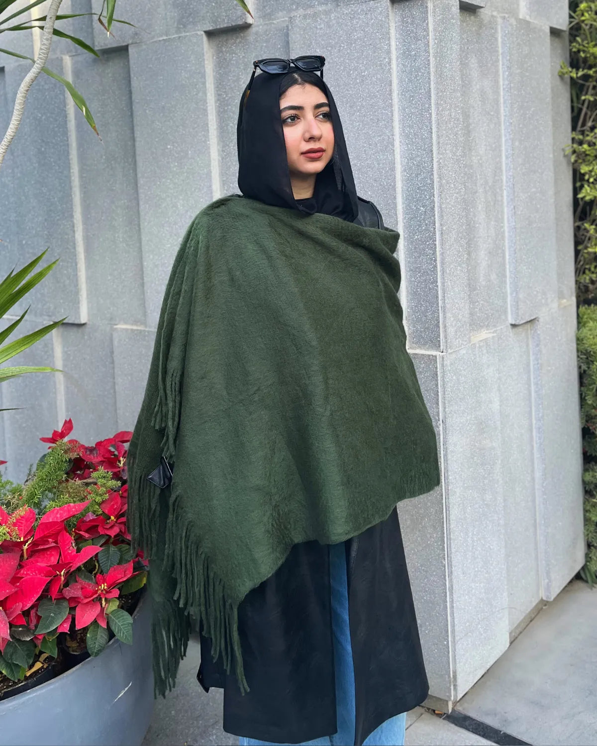 Olive green mohair shawl draped elegantly showing soft texture and fringe detailing